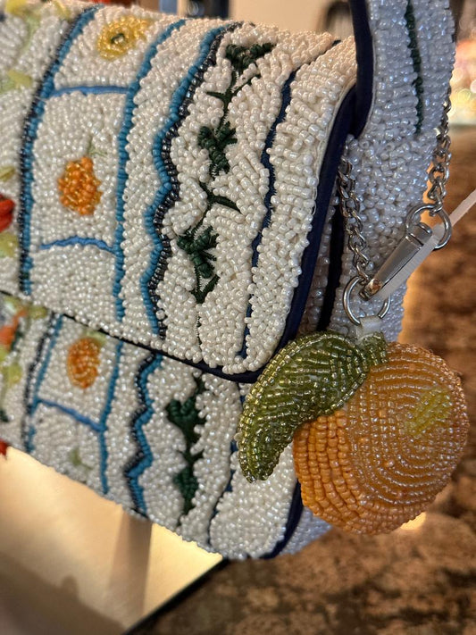 Trending Beaded Bags and Resort Collection - White Beaded Floral Orange Checkered Shoulder Bag with Orange Bag Charm