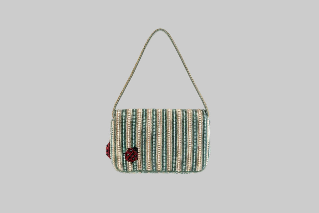 Striped handbag with a ladybug charm i