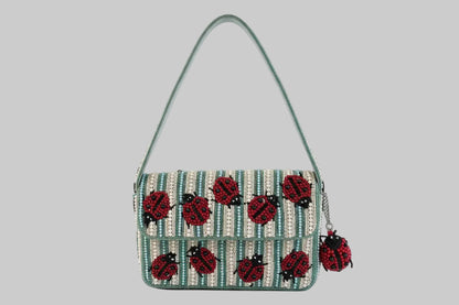 Beaded Handbag with ladybug patterns and lady bug bag charm