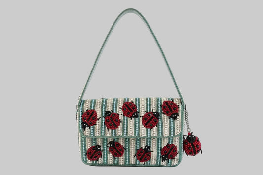 Beaded Handbag with ladybug patterns and lady bug bag charm