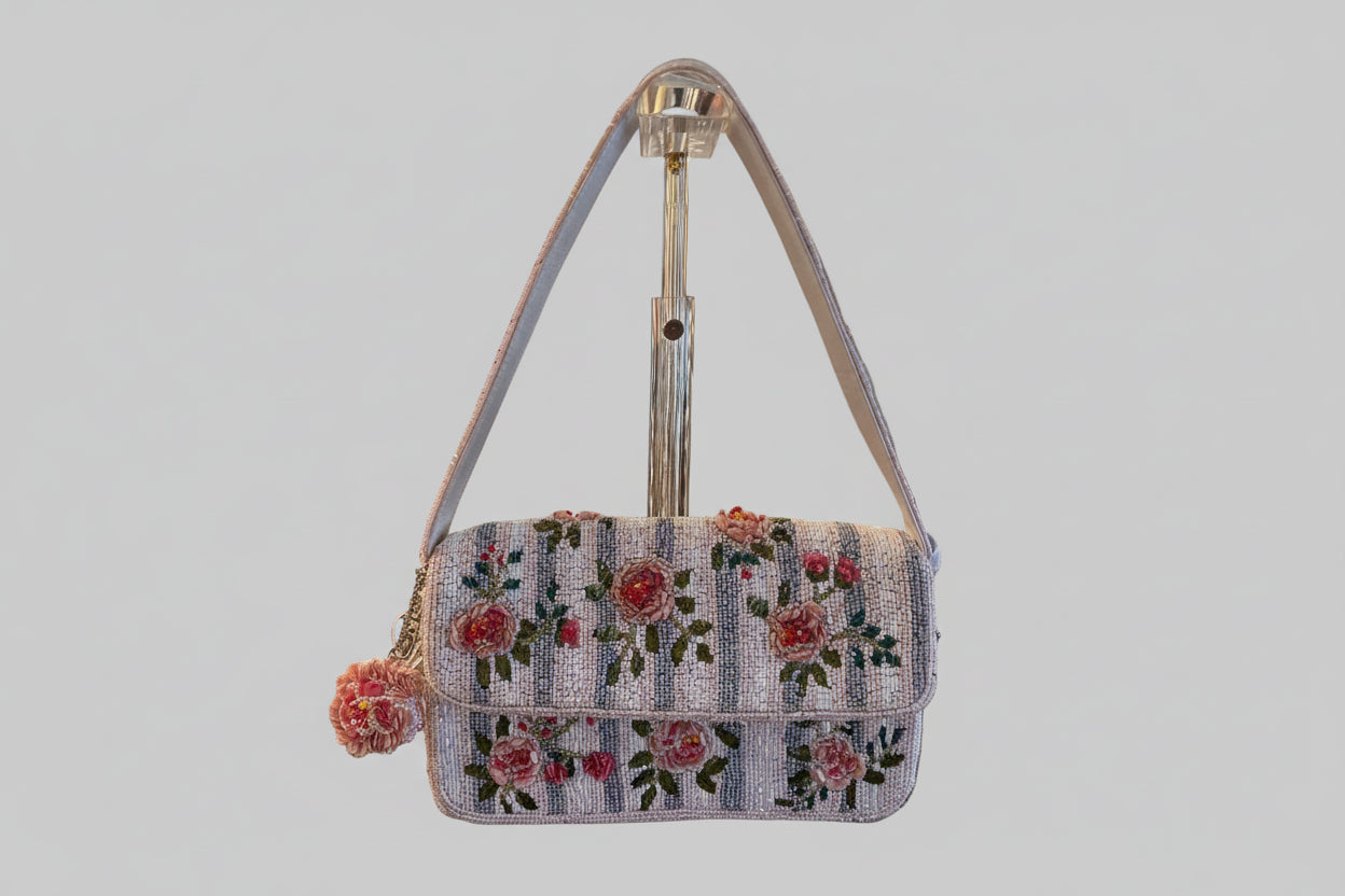 Beaded bag with pink roses and a matching pink rose bag charm 