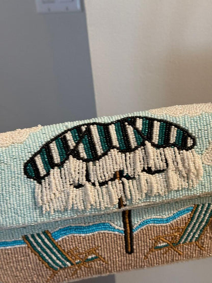 Trending Beaded Bags and Resort Collection - Blue Beach Chairs with Umbrella