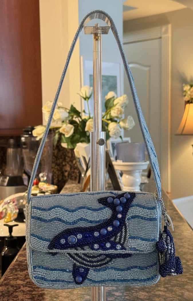 Handbag with whale design on a kitchen counter