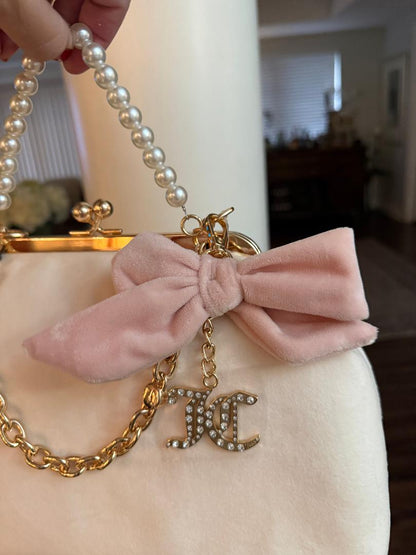 Trending Beaded Bags and Resort Collection - Juicy Couture Kiss Lock Blush Pink Velvet Cream Frame Bag