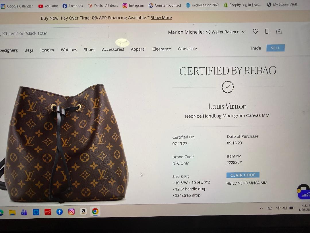 Louis Vuitton handbag displayed on a computer screen with certification details.