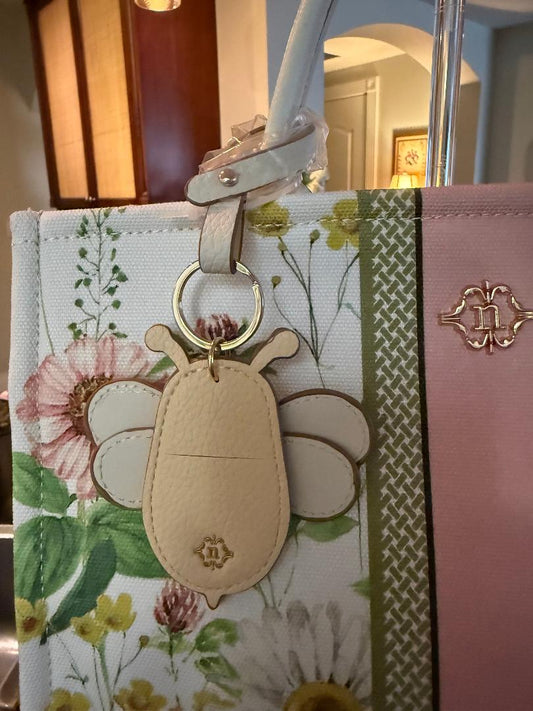Trending Beaded Bags and Resort Collection - Nanette Lepore Floral Tote with Bee Bag Charm