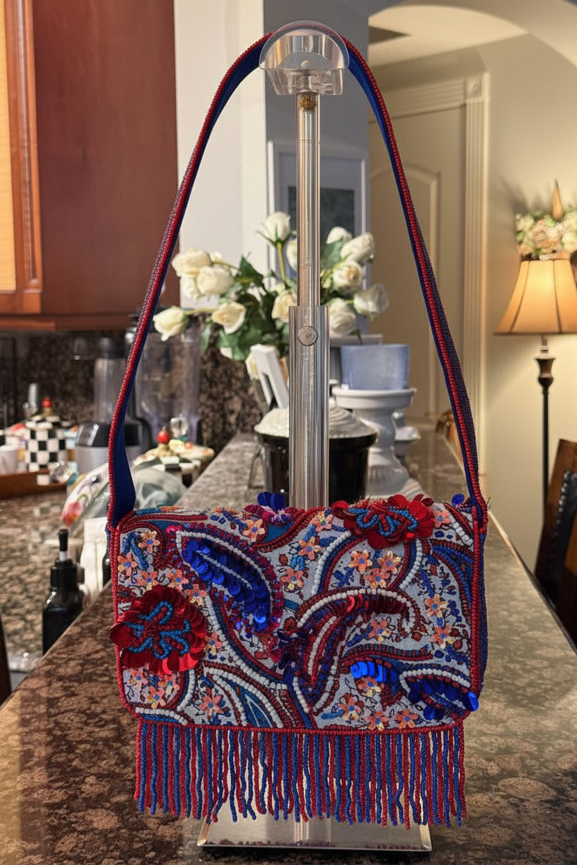 Decorative handbag with intricate patterns on a kitchen counter
