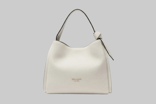 Kate Spade White handbag with 'kate spade' branding with silver hardware